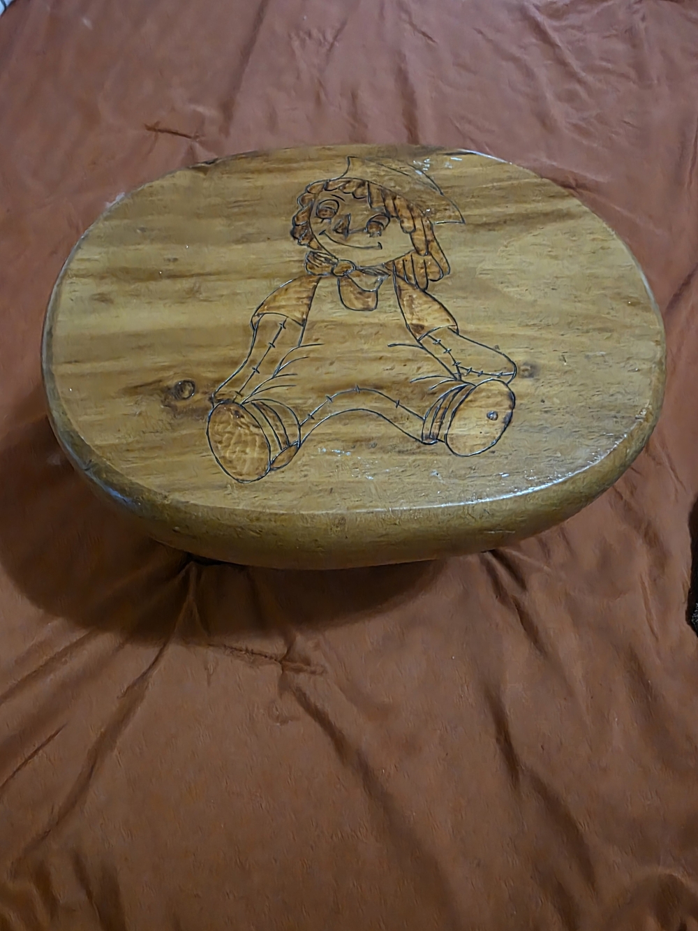 Hand-Carved Wooden Stool with Doll Pyrography